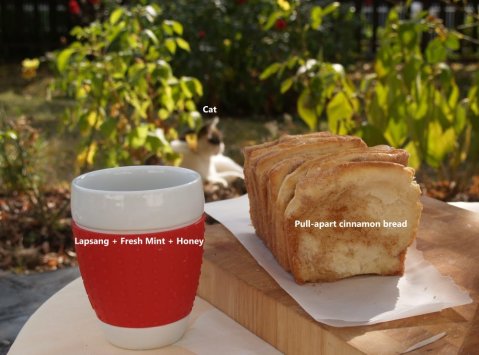Still life with pastry, tea and cat (cat's not moving much so it's technically a still life)